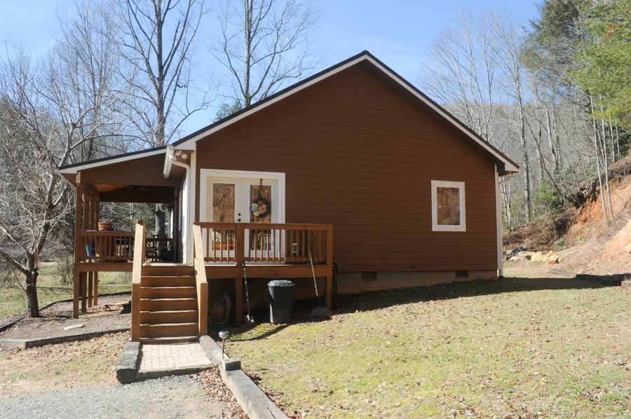 Mountain cabin on a wooded lot built by ARCH Home Crafters