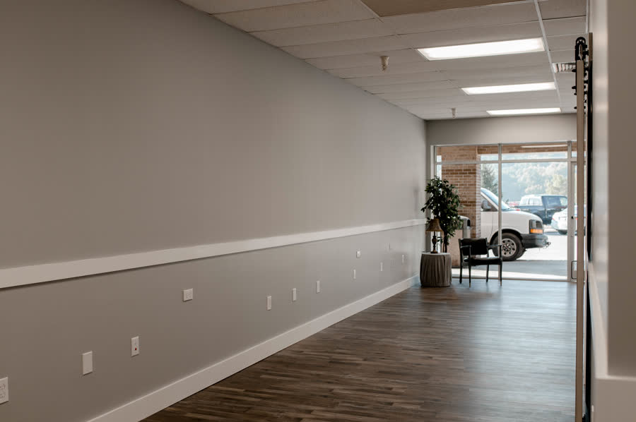 Commercial front office with new flooring and trim